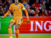 Netherlands defender Virgil van Dijk plays during the match between the Netherlands and Germany at the Johan Cruijff ArenA for the UEFA Nati...