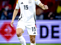 Germany defender Nico Schlotterbeck plays during the match between the Netherlands and Germany at the Johan Cruijff ArenA for the UEFA Natio...