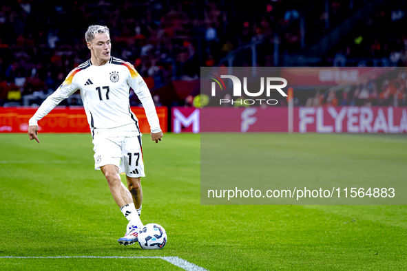 Germany midfielder Florian Wirtz plays during the match between the Netherlands and Germany at the Johan Cruijff ArenA for the UEFA Nations...