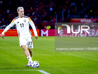 Germany midfielder Florian Wirtz plays during the match between the Netherlands and Germany at the Johan Cruijff ArenA for the UEFA Nations...