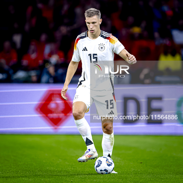 Germany defender Nico Schlotterbeck plays during the match between the Netherlands and Germany at the Johan Cruijff ArenA for the UEFA Natio...