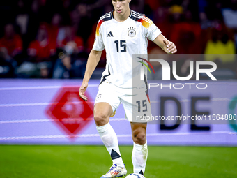 Germany defender Nico Schlotterbeck plays during the match between the Netherlands and Germany at the Johan Cruijff ArenA for the UEFA Natio...