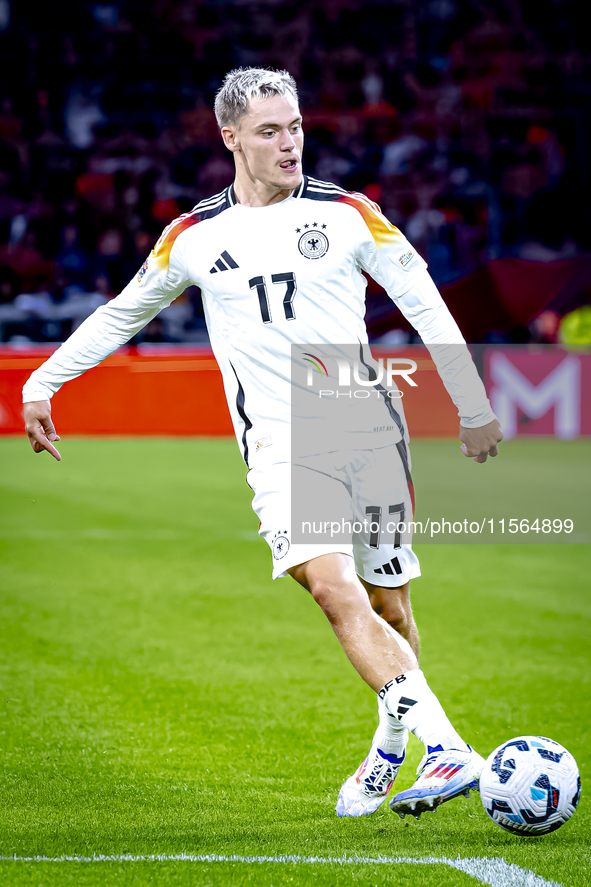 Germany midfielder Florian Wirtz plays during the match between the Netherlands and Germany at the Johan Cruijff ArenA for the UEFA Nations...