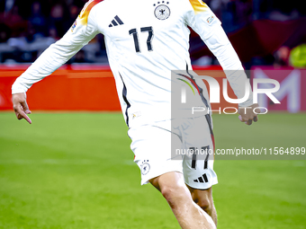 Germany midfielder Florian Wirtz plays during the match between the Netherlands and Germany at the Johan Cruijff ArenA for the UEFA Nations...