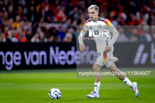 Germany midfielder Florian Wirtz plays during the match between the Netherlands and Germany at the Johan Cruijff ArenA for the UEFA Nations...