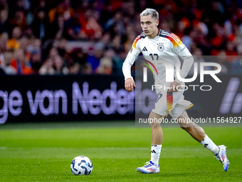 Germany midfielder Florian Wirtz plays during the match between the Netherlands and Germany at the Johan Cruijff ArenA for the UEFA Nations...