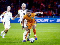 Germany midfielder Robert Andrich and Netherlands midfielder Quinten Timber during the match between the Netherlands and Germany at the Joha...