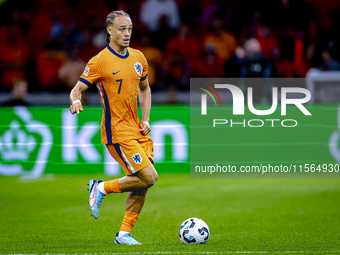 Netherlands midfielder Xavi Simons plays during the match between the Netherlands and Germany at the Johan Cruijff ArenA for the UEFA Nation...