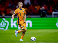 Netherlands midfielder Xavi Simons plays during the match between the Netherlands and Germany at the Johan Cruijff ArenA for the UEFA Nation...