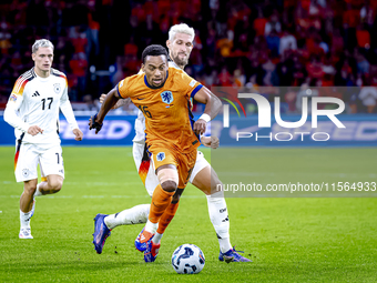 Germany midfielder Robert Andrich and Netherlands midfielder Quinten Timber during the match between the Netherlands and Germany at the Joha...