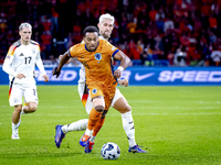 Germany midfielder Robert Andrich and Netherlands midfielder Quinten Timber during the match between the Netherlands and Germany at the Joha...