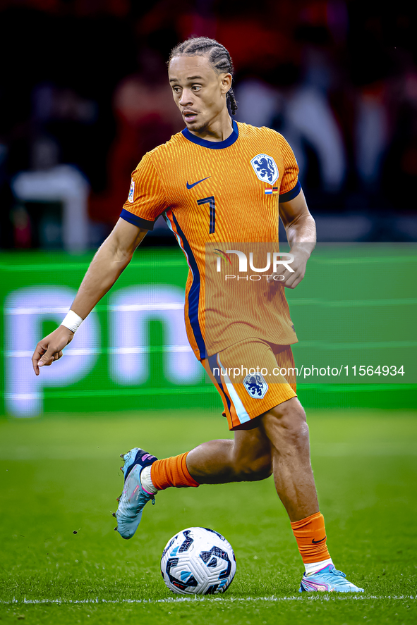 Netherlands midfielder Xavi Simons plays during the match between the Netherlands and Germany at the Johan Cruijff ArenA for the UEFA Nation...