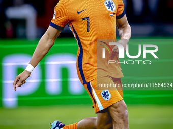 Netherlands midfielder Xavi Simons plays during the match between the Netherlands and Germany at the Johan Cruijff ArenA for the UEFA Nation...