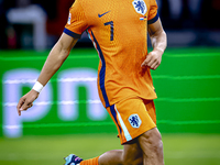 Netherlands midfielder Xavi Simons plays during the match between the Netherlands and Germany at the Johan Cruijff ArenA for the UEFA Nation...