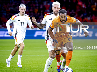 Germany midfielder Robert Andrich and Netherlands midfielder Quinten Timber during the match between the Netherlands and Germany at the Joha...