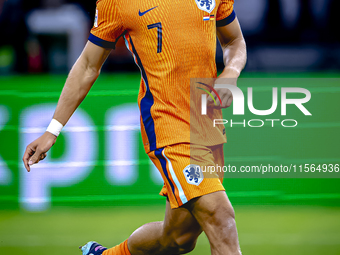 Netherlands midfielder Xavi Simons plays during the match between the Netherlands and Germany at the Johan Cruijff ArenA for the UEFA Nation...