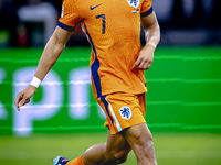 Netherlands midfielder Xavi Simons plays during the match between the Netherlands and Germany at the Johan Cruijff ArenA for the UEFA Nation...