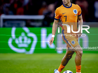 Netherlands midfielder Xavi Simons plays during the match between the Netherlands and Germany at the Johan Cruijff ArenA for the UEFA Nation...