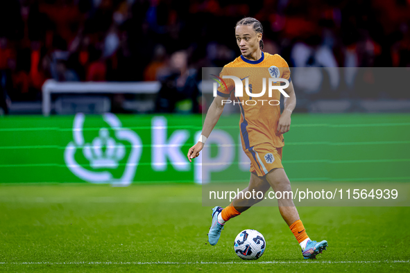 Netherlands midfielder Xavi Simons plays during the match between the Netherlands and Germany at the Johan Cruijff ArenA for the UEFA Nation...