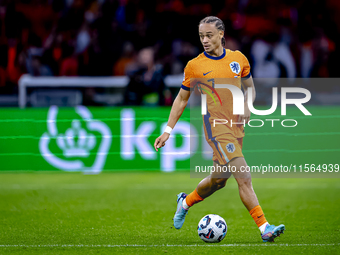 Netherlands midfielder Xavi Simons plays during the match between the Netherlands and Germany at the Johan Cruijff ArenA for the UEFA Nation...