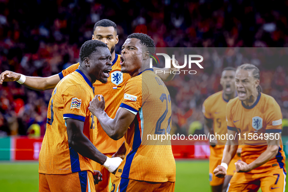 Netherlands forward Brian Brobbey and Netherlands defender Denzel Dumfries celebrate the goal during the match between the Netherlands and G...