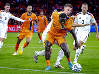 Germany defender Nico Schlotterbeck and Netherlands forward Brian Brobbey during the match between Netherlands and Germany at the Johan Crui...