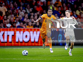 Netherlands midfielder Ryan Gravenberch and Germany midfielder Florian Wirtz during the match between the Netherlands and Germany at the Joh...