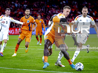 Germany defender Nico Schlotterbeck and Netherlands forward Brian Brobbey during the match between Netherlands and Germany at the Johan Crui...