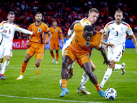 Germany defender Nico Schlotterbeck and Netherlands forward Brian Brobbey during the match between Netherlands and Germany at the Johan Crui...