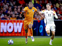 Netherlands midfielder Ryan Gravenberch and Germany midfielder Florian Wirtz during the match between the Netherlands and Germany at the Joh...