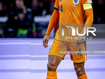 Netherlands defender Virgil van Dijk plays during the match between the Netherlands and Germany at the Johan Cruijff ArenA for the UEFA Nati...