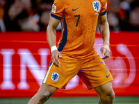 Netherlands midfielder Xavi Simons plays during the match between the Netherlands and Germany at the Johan Cruijff ArenA for the UEFA Nation...