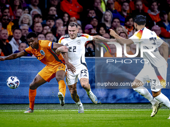 Netherlands defender Denzel Dumfries and Germany defender David Raum during the match between the Netherlands and Germany at the Johan Cruij...