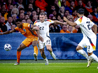 Netherlands defender Denzel Dumfries and Germany defender David Raum during the match between the Netherlands and Germany at the Johan Cruij...