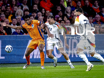 Netherlands defender Denzel Dumfries and Germany defender David Raum during the match between the Netherlands and Germany at the Johan Cruij...