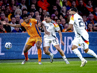 Netherlands defender Denzel Dumfries and Germany defender David Raum during the match between the Netherlands and Germany at the Johan Cruij...