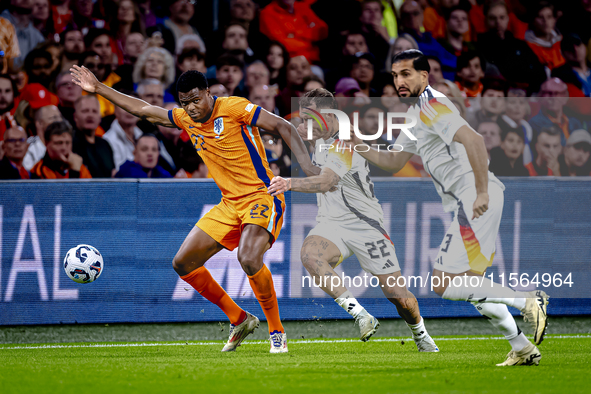 Netherlands defender Denzel Dumfries and Germany defender David Raum during the match between the Netherlands and Germany at the Johan Cruij...