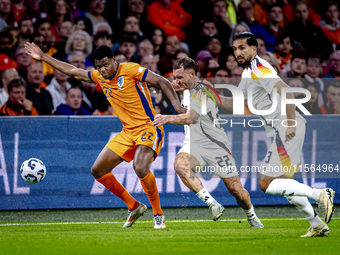 Netherlands defender Denzel Dumfries and Germany defender David Raum during the match between the Netherlands and Germany at the Johan Cruij...