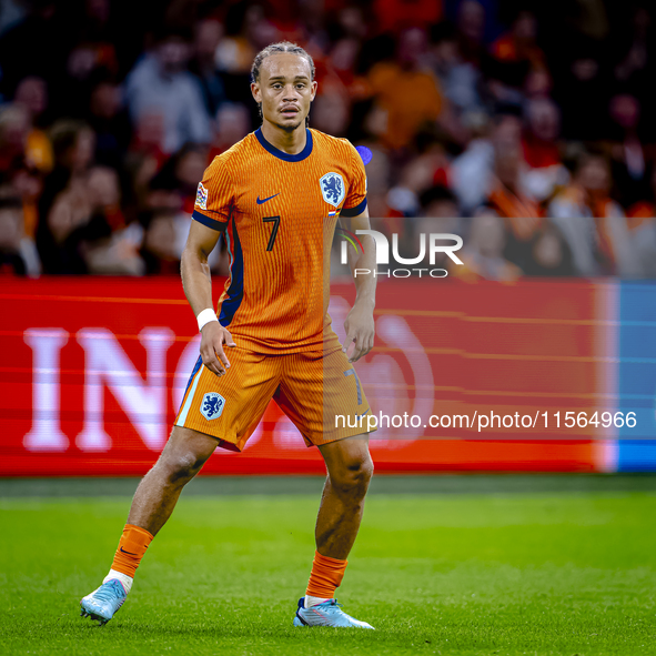 Netherlands midfielder Xavi Simons plays during the match between the Netherlands and Germany at the Johan Cruijff ArenA for the UEFA Nation...