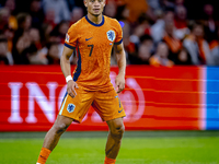 Netherlands midfielder Xavi Simons plays during the match between the Netherlands and Germany at the Johan Cruijff ArenA for the UEFA Nation...