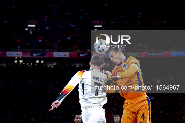 Germany forward Kai Havertz and Netherlands defender Virgil van Dijk during the match between the Netherlands and Germany at the Johan Cruij...