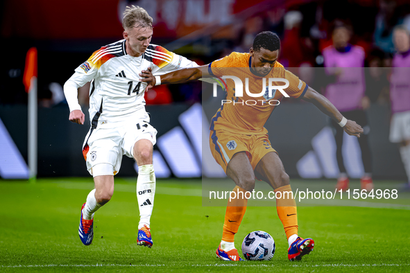 Germany forward Maximillian Beier and Netherlands defender Jurrien Timber during the match between the Netherlands and Germany at the Johan...