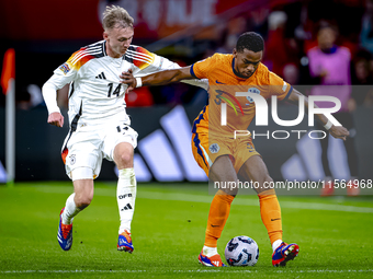 Germany forward Maximillian Beier and Netherlands defender Jurrien Timber during the match between the Netherlands and Germany at the Johan...