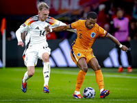 Germany forward Maximillian Beier and Netherlands defender Jurrien Timber during the match between the Netherlands and Germany at the Johan...