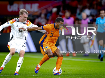 Germany forward Maximillian Beier and Netherlands defender Jurrien Timber during the match between the Netherlands and Germany at the Johan...