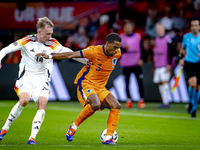 Germany forward Maximillian Beier and Netherlands defender Jurrien Timber during the match between the Netherlands and Germany at the Johan...