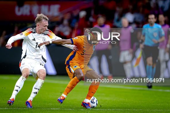 Germany forward Maximillian Beier and Netherlands defender Jurrien Timber during the match between the Netherlands and Germany at the Johan...