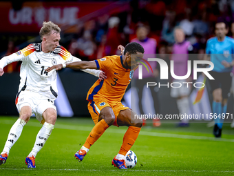 Germany forward Maximillian Beier and Netherlands defender Jurrien Timber during the match between the Netherlands and Germany at the Johan...