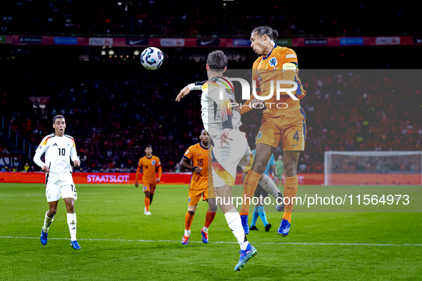 Germany forward Kai Havertz and Netherlands defender Virgil van Dijk during the match between the Netherlands and Germany at the Johan Cruij...