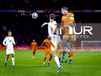 Germany forward Kai Havertz and Netherlands defender Virgil van Dijk during the match between the Netherlands and Germany at the Johan Cruij...